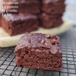 protein brownie on cooling rack with calories and macros