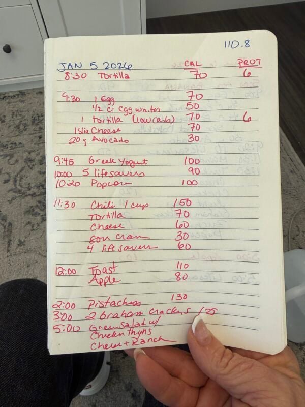 Handwritten calorie tracker for low calorie diet