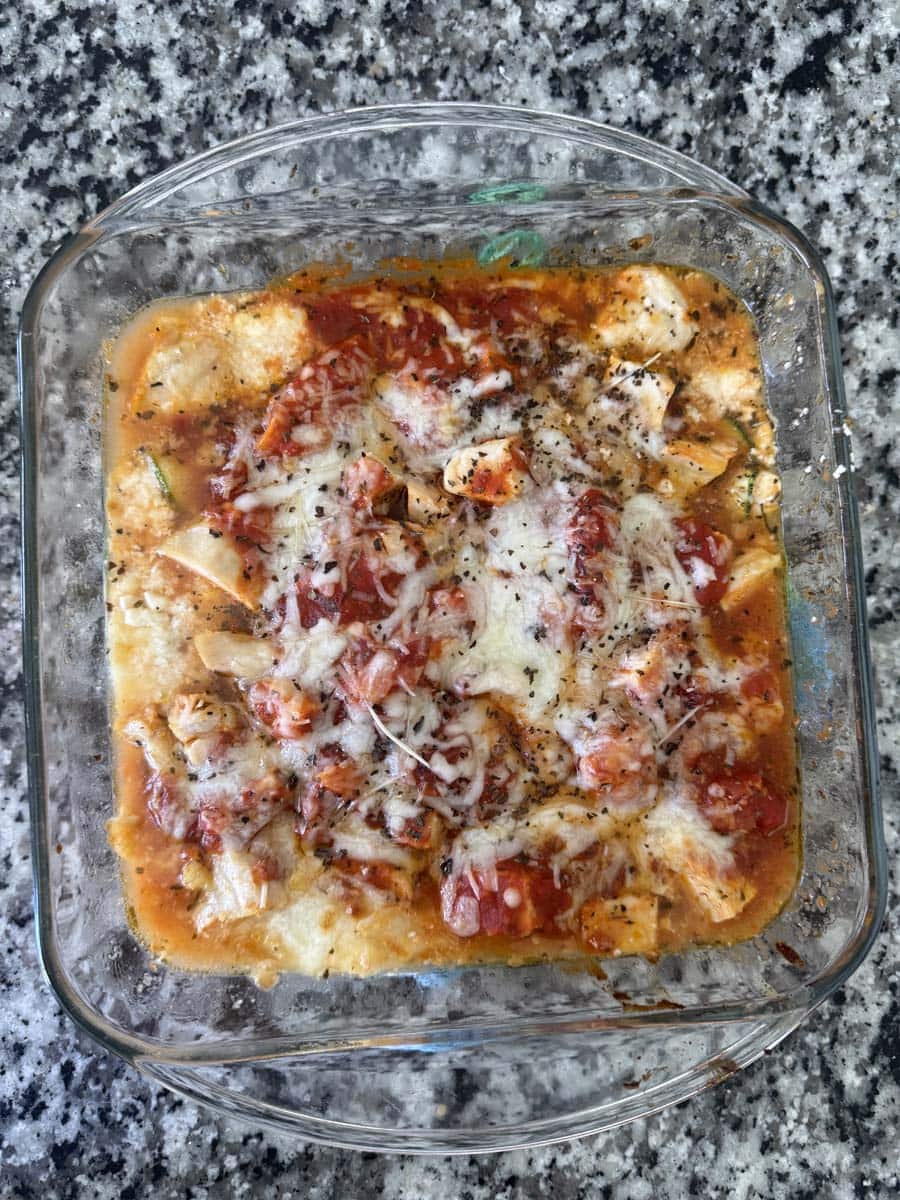 chicken parmesan protein recipe in a clear glass dish